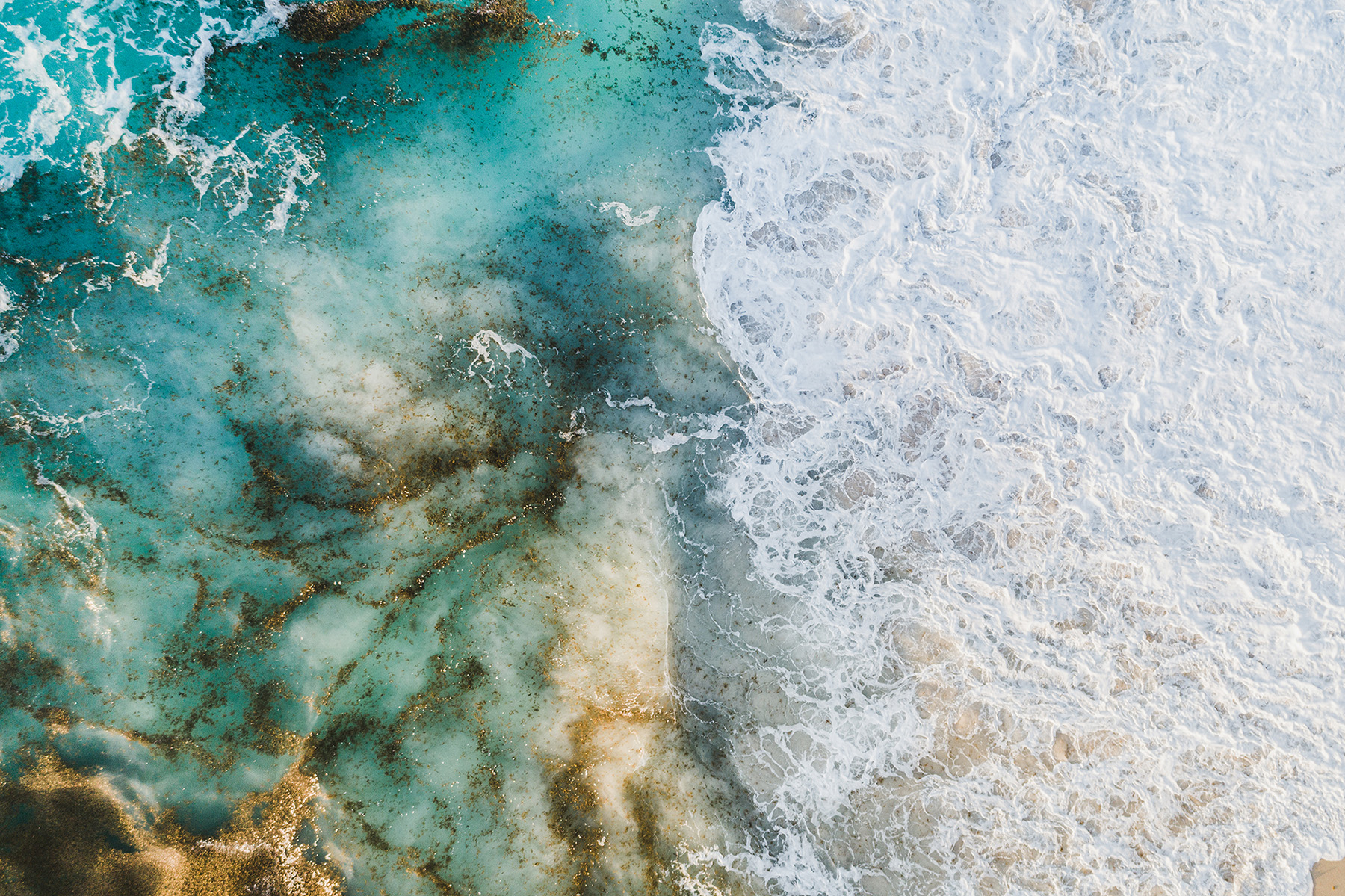 Waves crashing against a shore