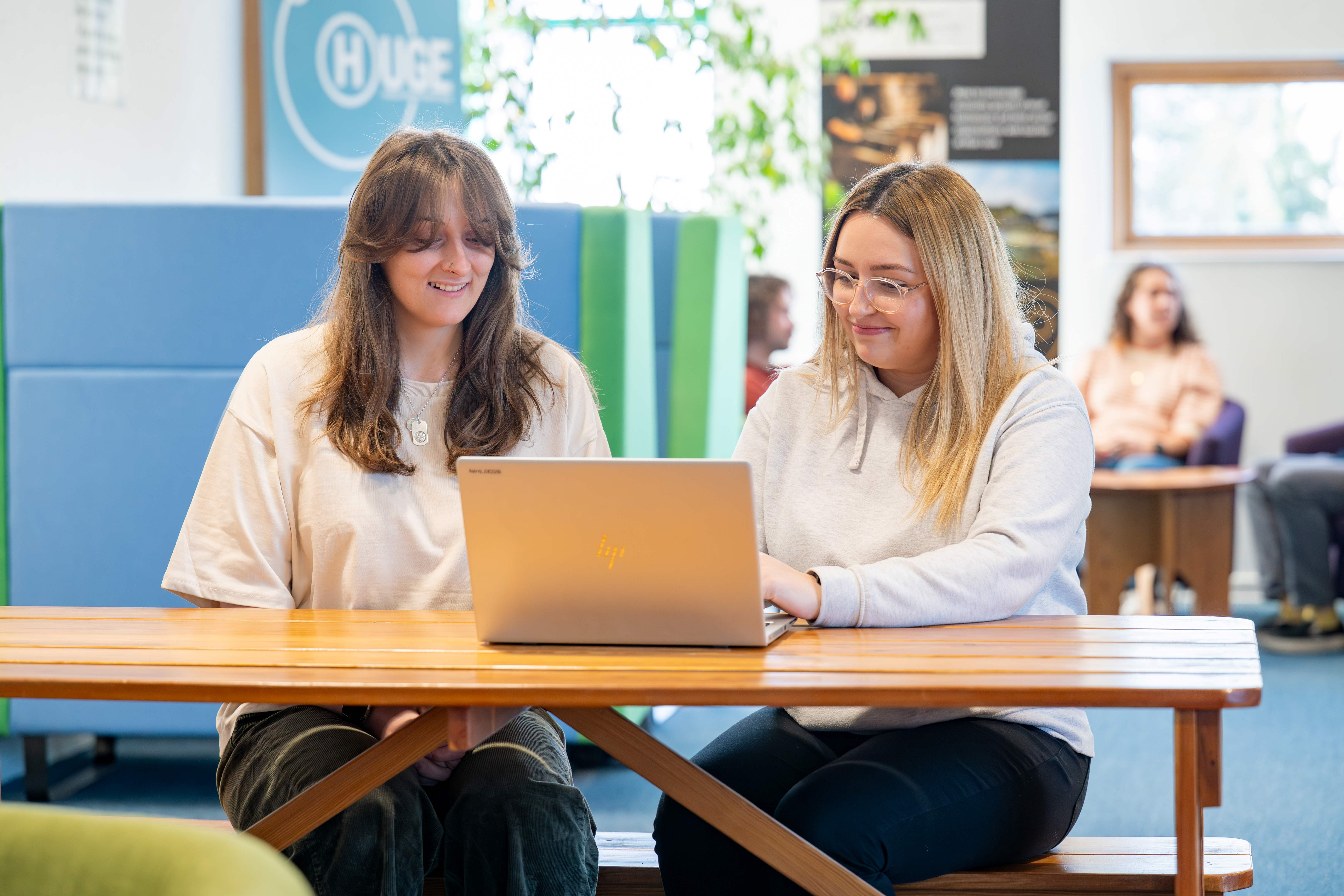 Two students studying on campus