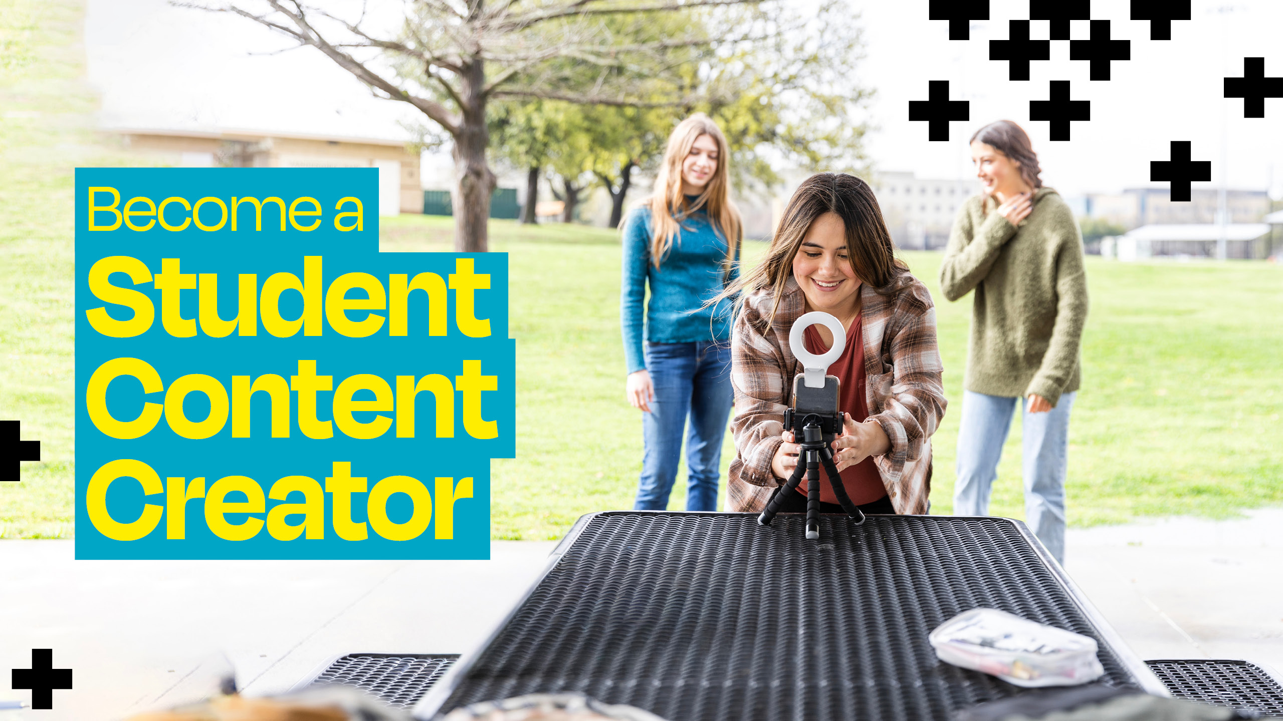 Group of 3 students outside creating content with a tripod and ring light. Yellow text on a blue background that reads 