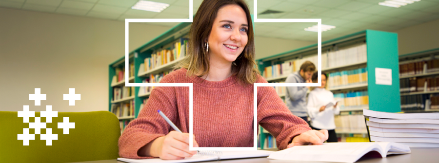Student studying in a library