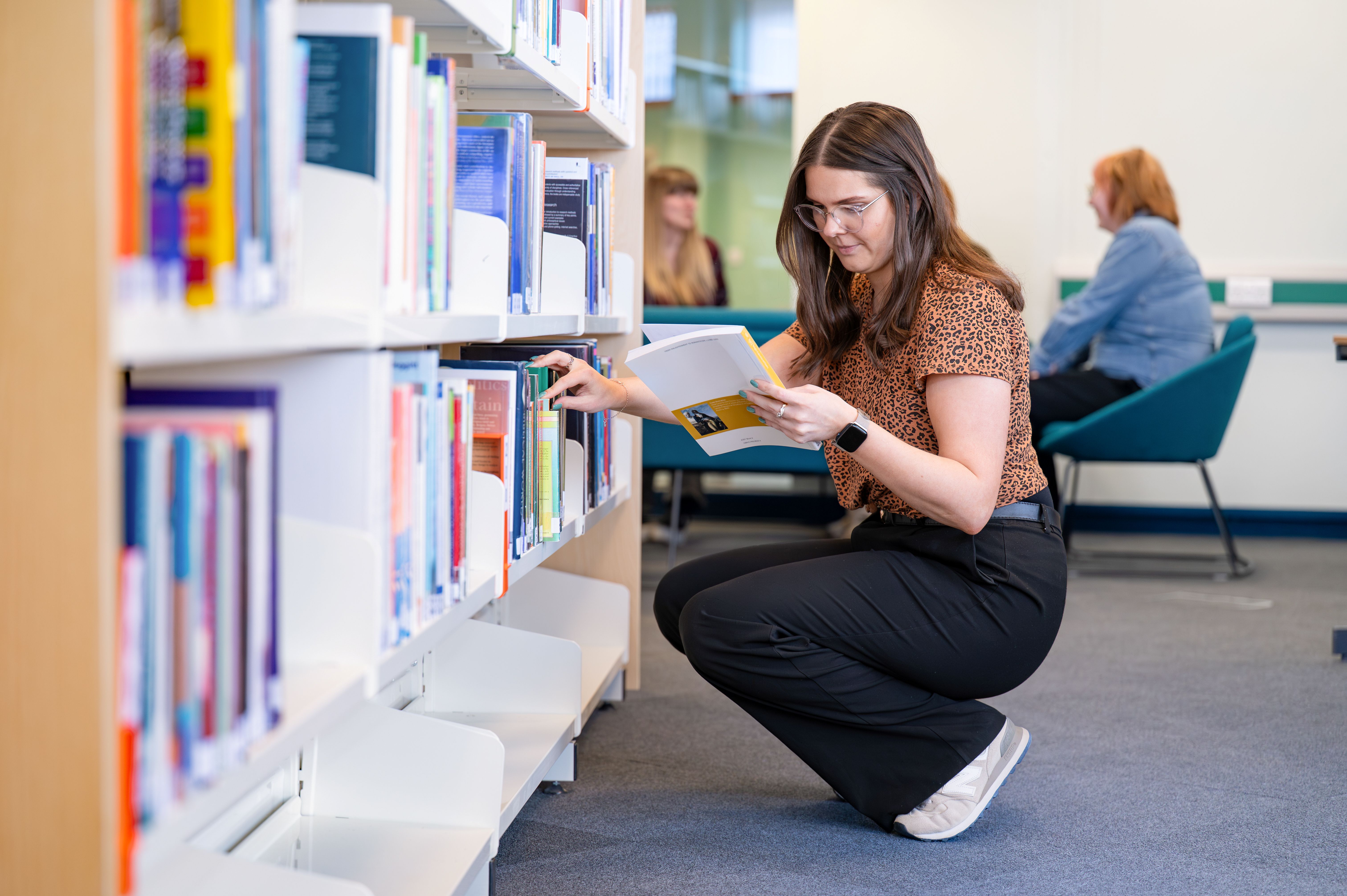 Student in Thurso library Student in Thurso library