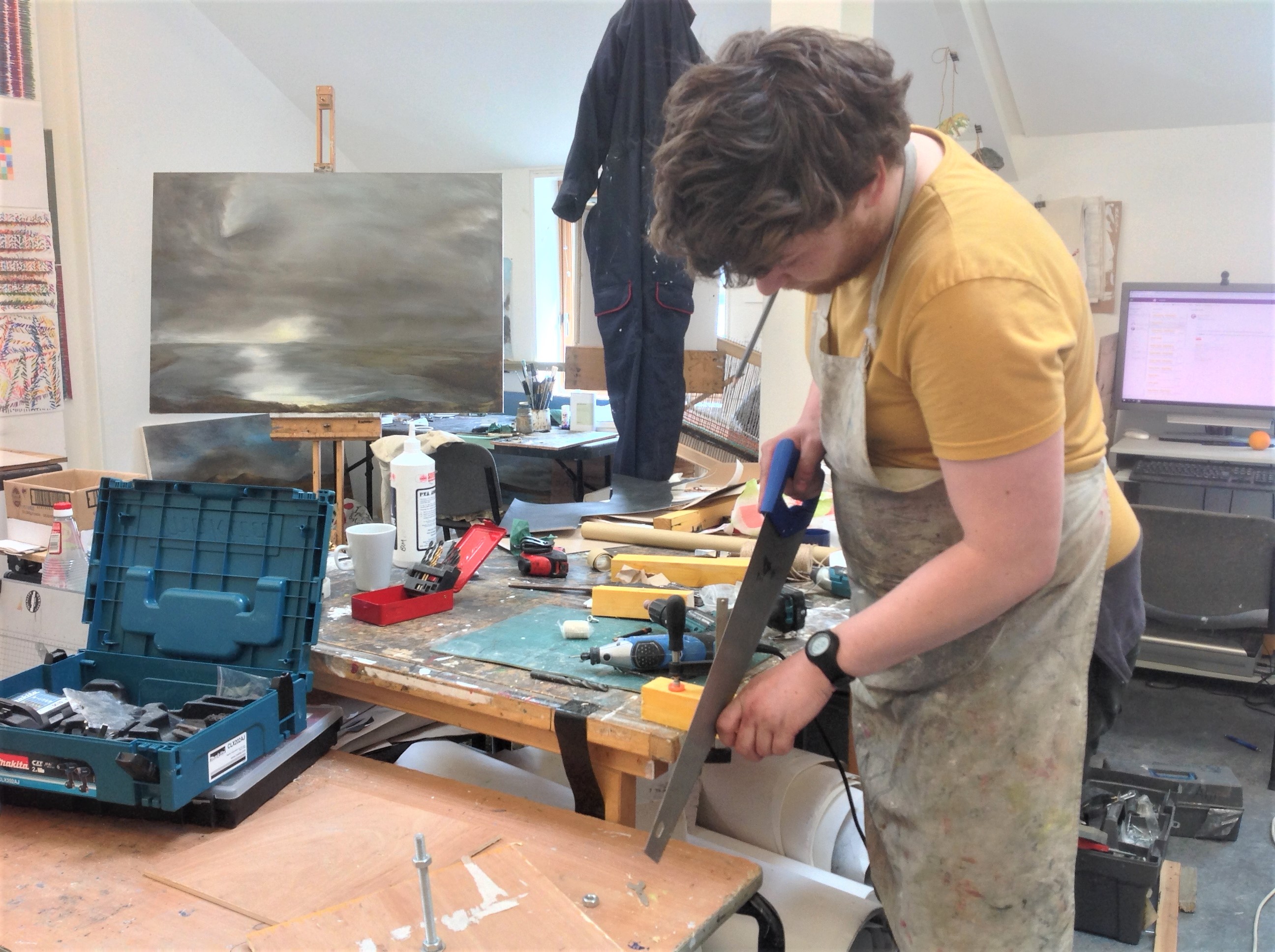 student in art workshop