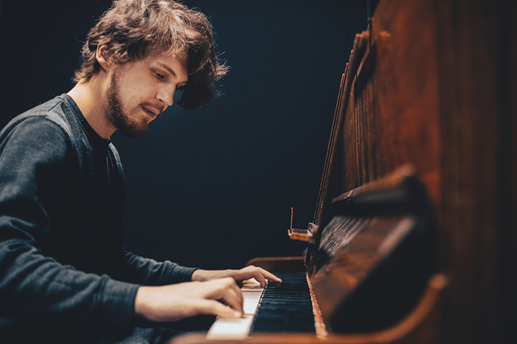 students playing piano