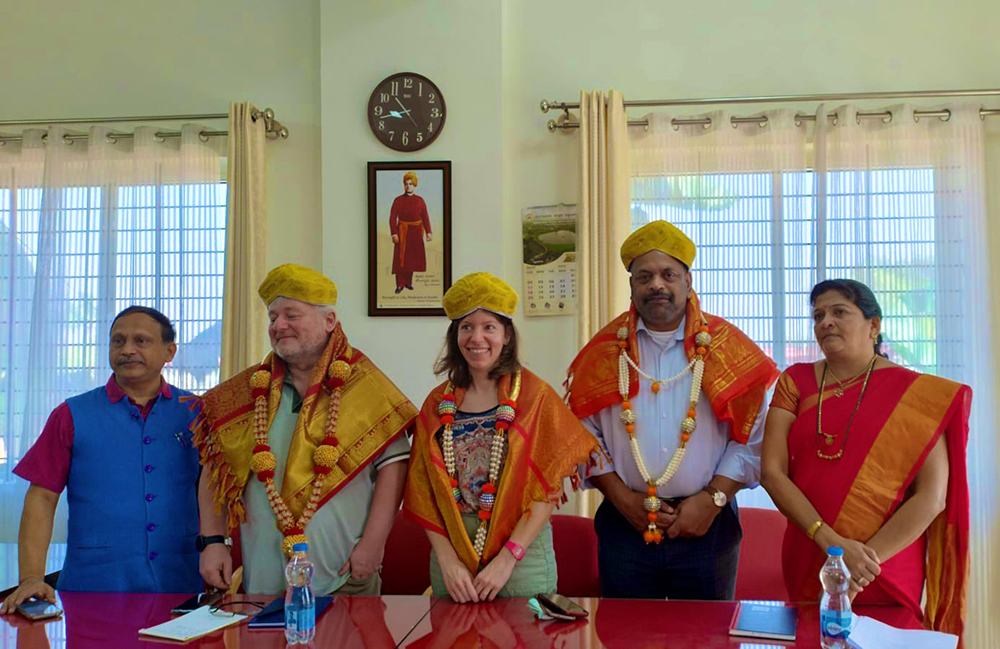 UHI staff being welcomed by Bangalore North University Staff