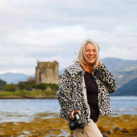 HNC Photography student Yvonne Macdonald outside Eilean Donan Castle